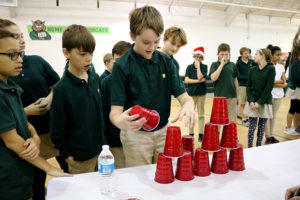 ACDS middle school students working with cups