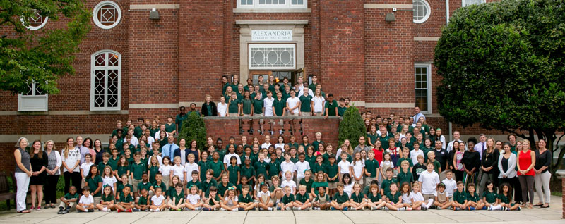 ACDS student body posing in front of school