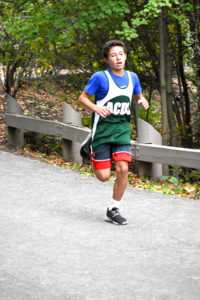 ACDS athletics male student running