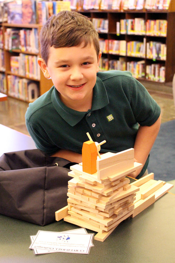 ACDS Lower School student in library